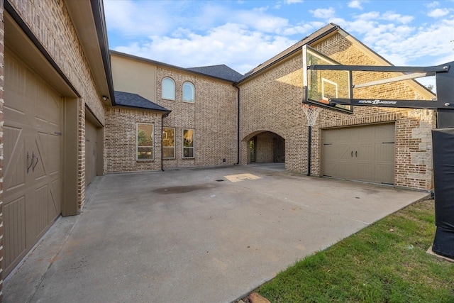 1229 Manchester Dr, Mclendon Chisholm, TX 75032 - view of patio / terrace featuring driveway and an attached garage