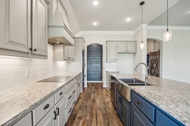 13609 Summer Moon Trl, Ponder, TX 76259 - kitchen with black electric cooktop, stainless steel dishwasher, arched walkways, premium range hood, and crown molding