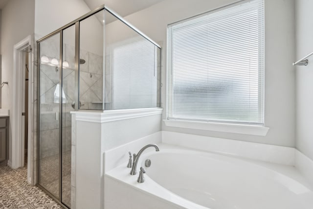 13609 Summer Moon Trl, Ponder, TX 76259 - full bath with a garden tub, a shower stall, and vanity