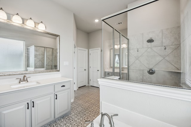 13609 Summer Moon Trl, Ponder, TX 76259 - bathroom featuring a stall shower, vanity, and recessed lighting