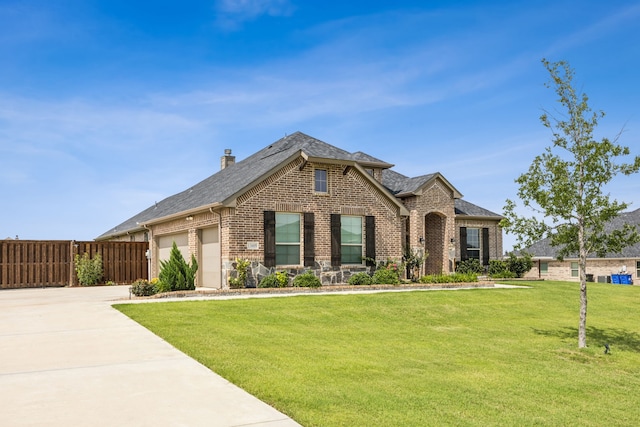 13609 Summer Moon Trl, Ponder, TX 76259 - view of front of house with brick siding, driveway, an attached garage, and a shingled roof