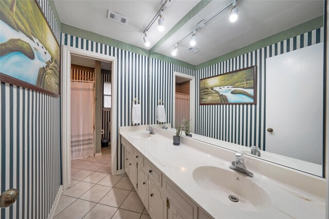 1715 Venetian Cir, Arlington, TX 76013 - full bathroom featuring wallpapered walls, tile patterned floors, double vanity, and a shower with curtain