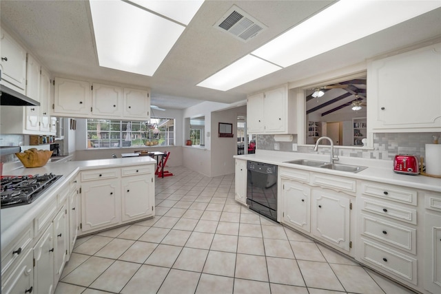 1715 Venetian Cir, Arlington, TX 76013 - kitchen with dishwasher, gas cooktop, a ceiling fan, decorative backsplash, and a sink