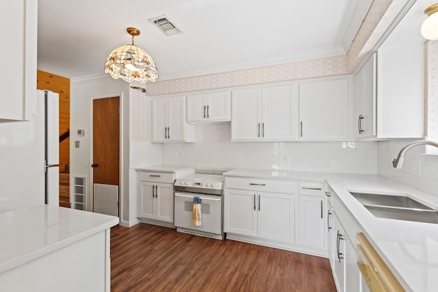 791 Cedar Oak Dr, Pottsboro, TX 75076 - kitchen with white appliances, white cabinetry, dark wood-style flooring, a sink, and tasteful backsplash