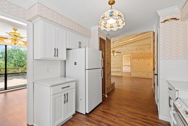 791 Cedar Oak Dr, Pottsboro, TX 75076 - kitchen featuring freestanding refrigerator, wallpapered walls, crown molding, dark wood-style floors, and white cabinetry