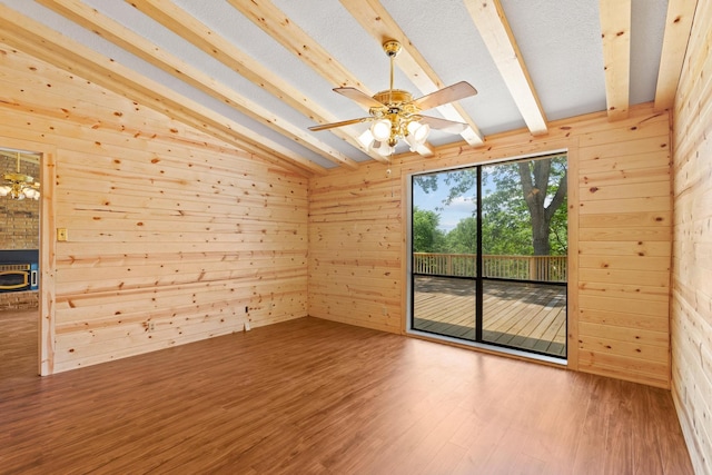 791 Cedar Oak Dr, Pottsboro, TX 75076 - spare room with wood walls, ceiling fan, and wood finished floors