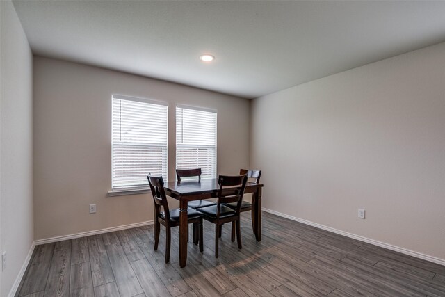 1609 Silas Dr, Forney, TX 75126 - dining area with dark wood finished floors, baseboards, and recessed lighting