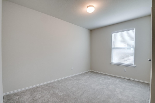 1609 Silas Dr, Forney, TX 75126 - spare room featuring carpet and baseboards