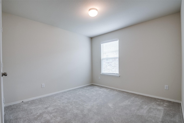 1609 Silas Dr, Forney, TX 75126 - empty room featuring carpet flooring and baseboards