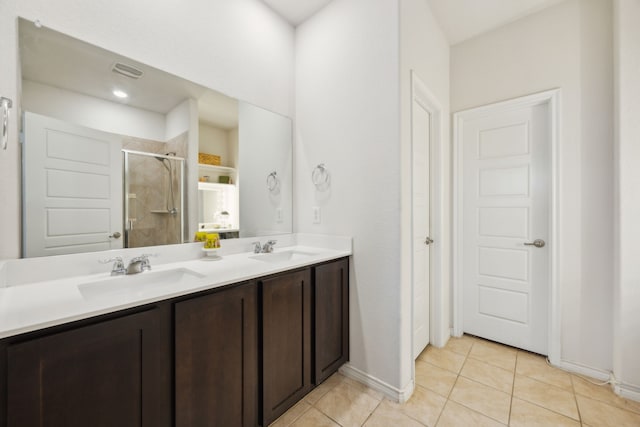 152 Whitetail Way, Caddo Mills, TX 75135 - full bath with a stall shower, double vanity, tile patterned floors, and baseboards