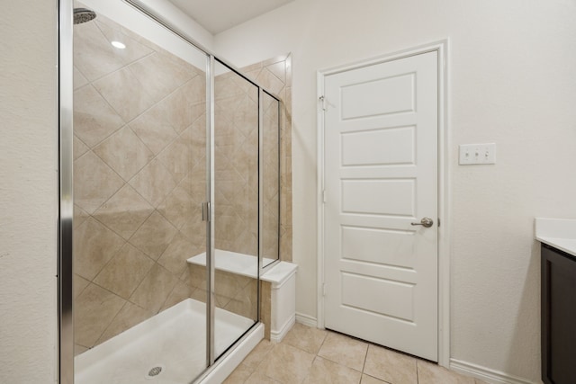 152 Whitetail Way, Caddo Mills, TX 75135 - bathroom featuring a shower stall, tile patterned floors, vanity, and baseboards