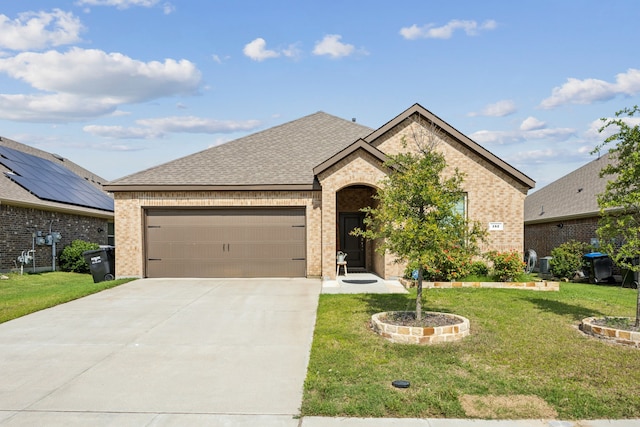 152 Whitetail Way, Caddo Mills, TX 75135 - french provincial home featuring brick siding, a garage, driveway, and a front yard