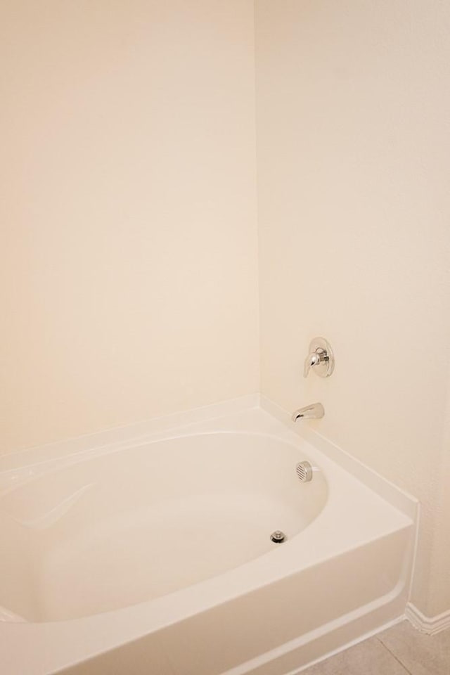 2225 Bernese Ln, Fort Worth, TX 76131 - bathroom featuring a bath and tile patterned flooring