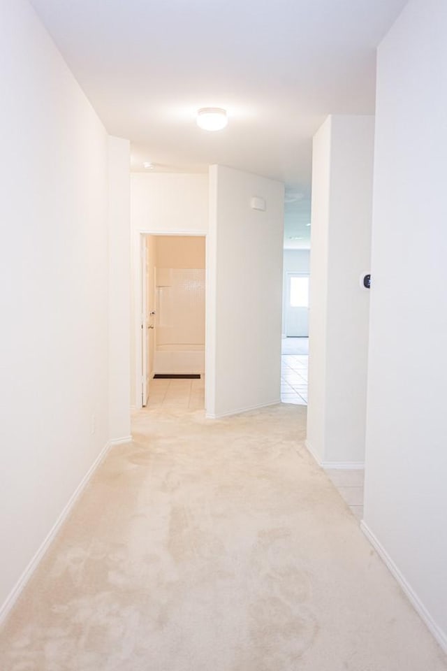 2225 Bernese Ln, Fort Worth, TX 76131 - hallway featuring light colored carpet and baseboards