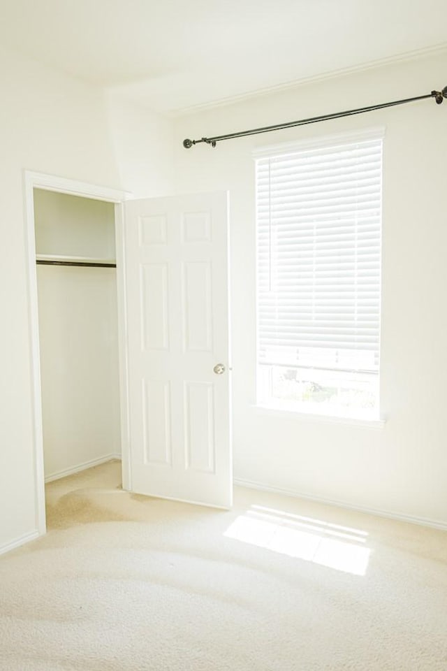 2225 Bernese Ln, Fort Worth, TX 76131 - unfurnished bedroom featuring carpet floors, a closet, and baseboards