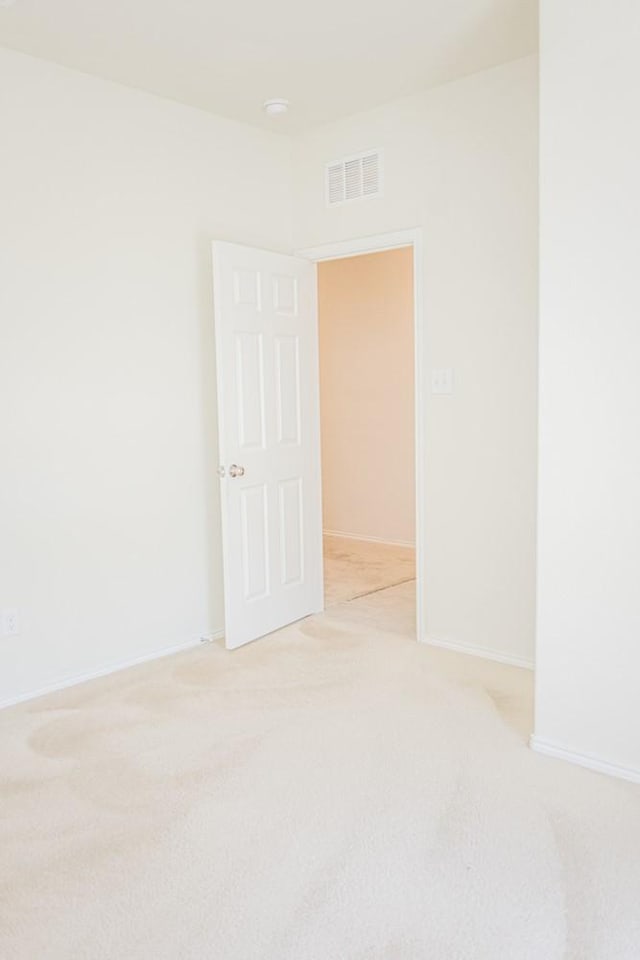 2225 Bernese Ln, Fort Worth, TX 76131 - empty room featuring light carpet and baseboards