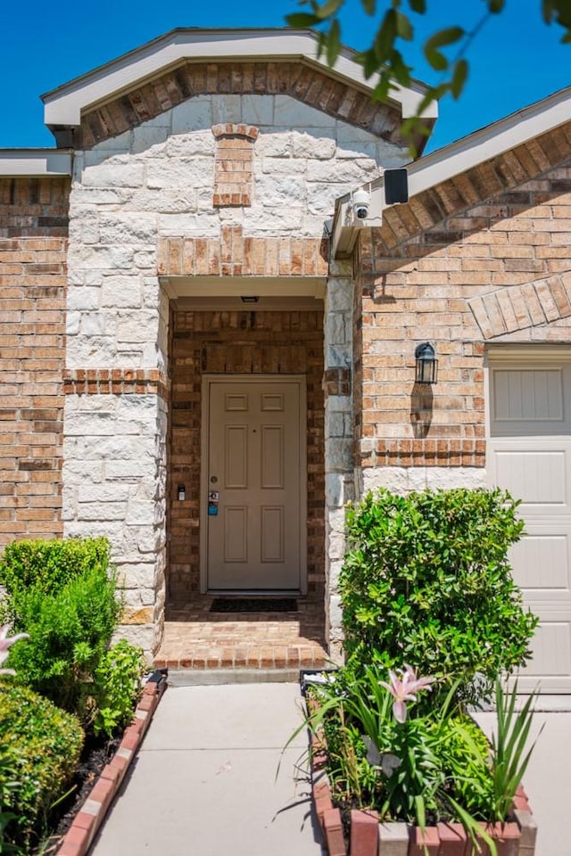 2225 Bernese Ln, Fort Worth, TX 76131 - doorway to property with stone siding
