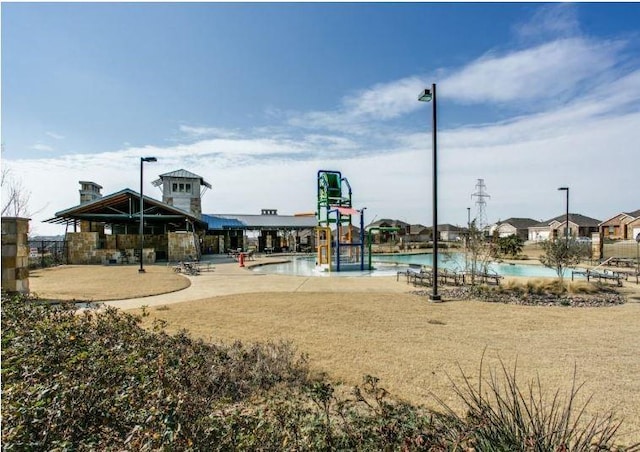 2225 Bernese Ln, Fort Worth, TX 76131 - view of jungle gym with a community pool and a water play area