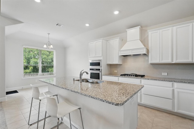 517 Fenwick Dr, Sunnyvale, TX 75182 - kitchen featuring a sink, appliances with stainless steel finishes, custom exhaust hood, light tile patterned floors, and recessed lighting