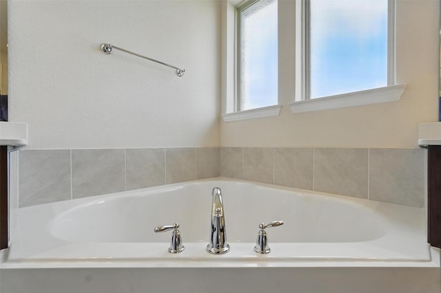 517 Fenwick Dr, Sunnyvale, TX 75182 - bathroom with a garden tub and vanity