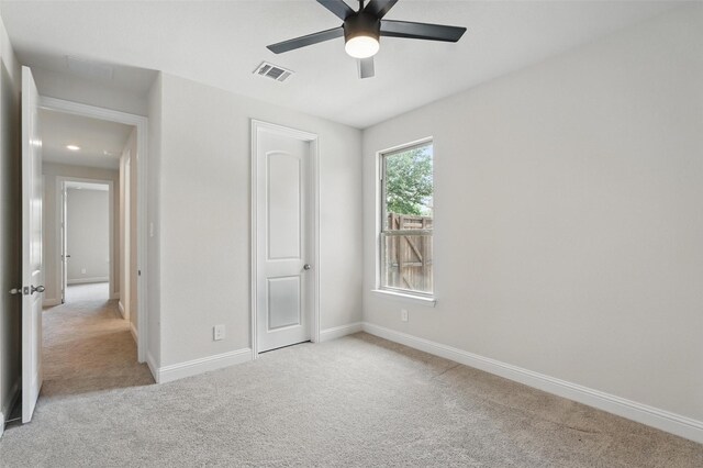 517 Fenwick Dr, Sunnyvale, TX 75182 - unfurnished bedroom featuring carpet floors, baseboards, and ceiling fan