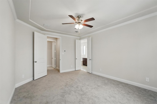 517 Fenwick Dr, Sunnyvale, TX 75182 - unfurnished bedroom featuring light colored carpet, crown molding, baseboards, ensuite bathroom, and ceiling fan