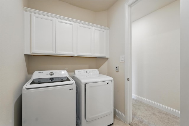 517 Fenwick Dr, Sunnyvale, TX 75182 - washroom with washer and clothes dryer, cabinet space, light carpet, and baseboards