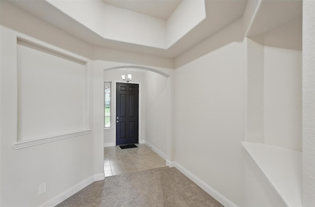 517 Fenwick Dr, Sunnyvale, TX 75182 - carpeted entrance foyer with arched walkways and baseboards