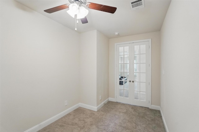 517 Fenwick Dr, Sunnyvale, TX 75182 - unfurnished room featuring french doors, baseboards, light colored carpet, and ceiling fan