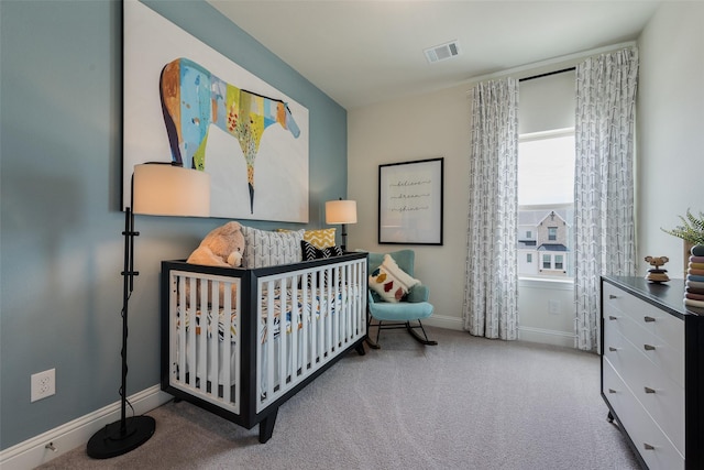 2233 Fort Bliss, Mesquite, TX 75149 - bedroom featuring a nursery area, carpet, and baseboards