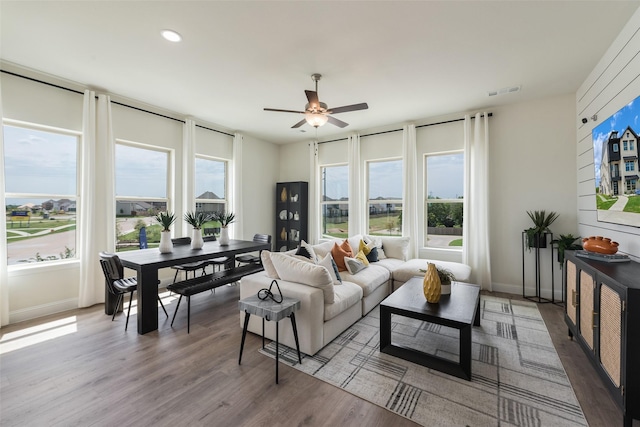 2233 Fort Bliss, Mesquite, TX 75149 - living room featuring a ceiling fan, wood finished floors, baseboards, and recessed lighting