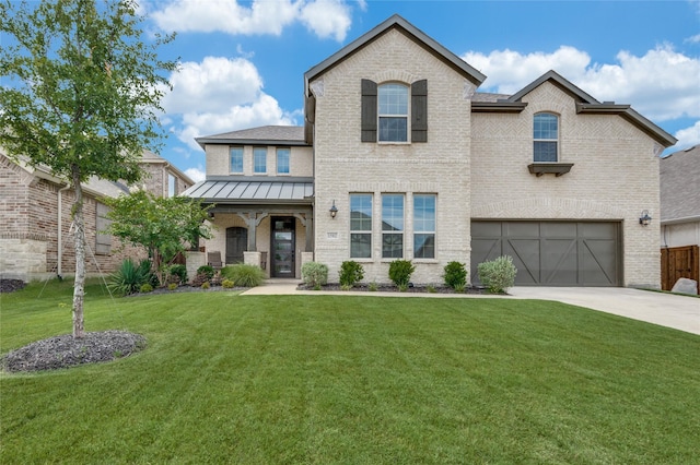 1502 Wild Indigo Dr, Mansfield, TX 76063 - view of front of house featuring a garage, a standing seam roof, brick siding, concrete driveway, and a front yard