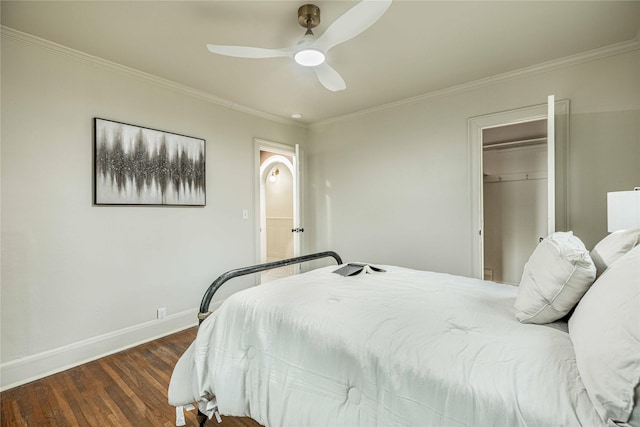 1225 Sayles Blvd, Abilene, TX 79605 - bedroom with dark wood-style floors, baseboards, crown molding, ceiling fan, and a closet