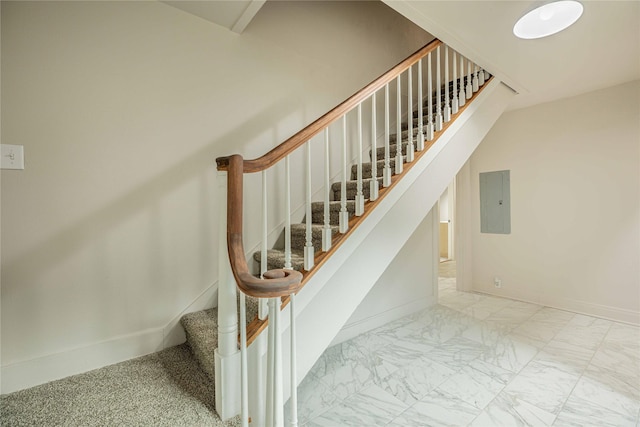 1225 Sayles Blvd, Abilene, TX 79605 - stairway with electric panel, baseboards, and marble finish floors