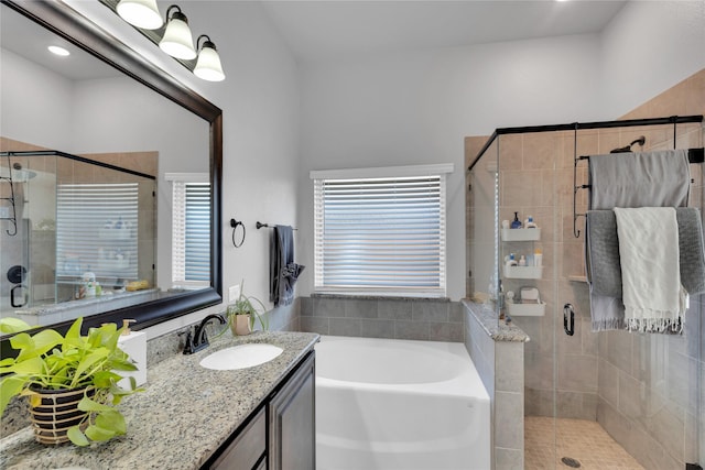 1621 Whispering Trail Dr, Waxahachie, TX 75165 - bathroom featuring a bath, vanity, and a shower stall