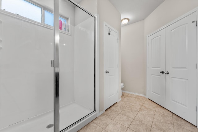 11212 Haviture Way, Waco, TX 76708 - bathroom with a stall shower, toilet, and tile patterned floors