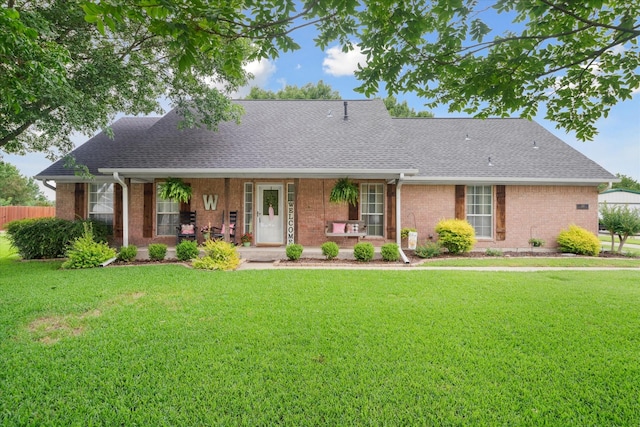221 Country View Ln, Crandall, TX 75114 - view of front of home with brick siding, a shingled roof, and covered porch