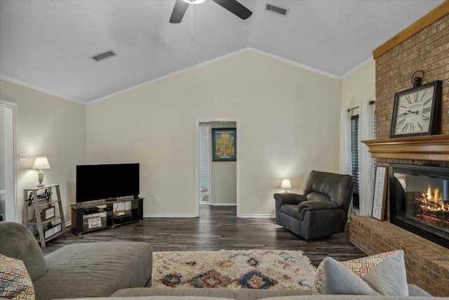221 Country View Ln, Crandall, TX 75114 - living area with a ceiling fan, vaulted ceiling, a fireplace, wood finished floors, and baseboards