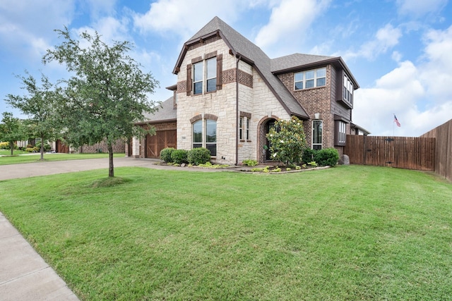 4705 Stillhouse Hollow Ln, Argyle, TX 76226 - view of front of home featuring a shingled roof, stone siding, driveway, a gate, and an attached garage
