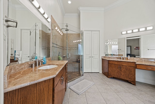 3413 De Vinci Dr, Plano, TX 75074 - bathroom with a stall shower, tile patterned flooring, crown molding, two vanities, and a high ceiling