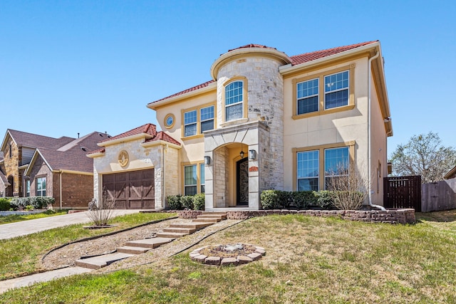 3413 De Vinci Dr, Plano, TX 75074 - mediterranean / spanish house featuring stucco siding, stone siding, a tile roof, an attached garage, and driveway