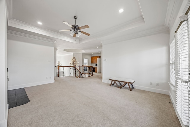 3413 De Vinci Dr, Plano, TX 75074 - carpeted empty room with ceiling fan, crown molding, a tray ceiling, a chandelier, and recessed lighting