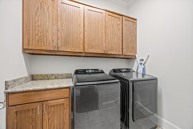 3413 De Vinci Dr, Plano, TX 75074 - laundry area featuring cabinet space, washing machine and clothes dryer, and crown molding