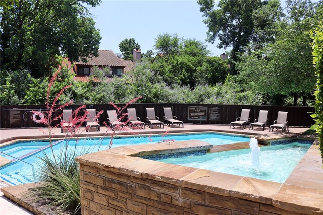 5616 Preston Oaks Rd Unit 508, Dallas, TX 75254 - community pool with a community hot tub