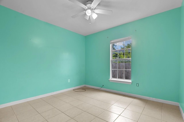 3829 Willing Ave, Fort Worth, TX 76110 - unfurnished room with a ceiling fan, baseboards, and light tile patterned flooring