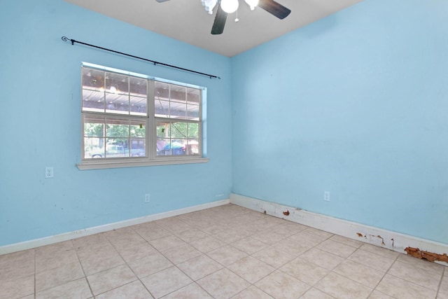 3829 Willing Ave, Fort Worth, TX 76110 - tiled spare room with a ceiling fan and baseboards