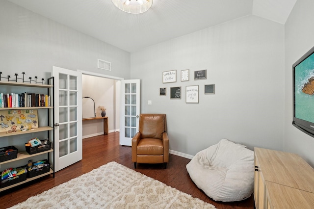 5104 Fringetree Dr, Mckinney, TX 75071 - sitting room featuring french doors, wood finished floors, baseboards, and vaulted ceiling