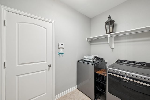 5104 Fringetree Dr, Mckinney, TX 75071 - laundry room with independent washer and dryer and baseboards