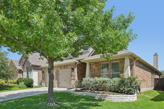 5104 Fringetree Dr, Mckinney, TX 75071 - view of front of home with concrete driveway, brick siding, an attached garage, and roof with shingles