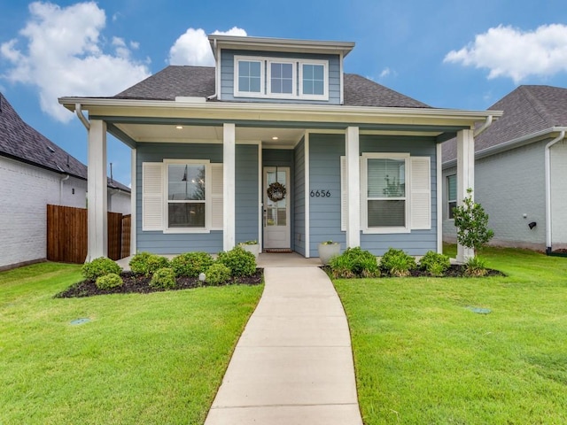 6656 Windfall Dr, Fort Worth, TX 76135 - bungalow with a shingled roof and covered porch